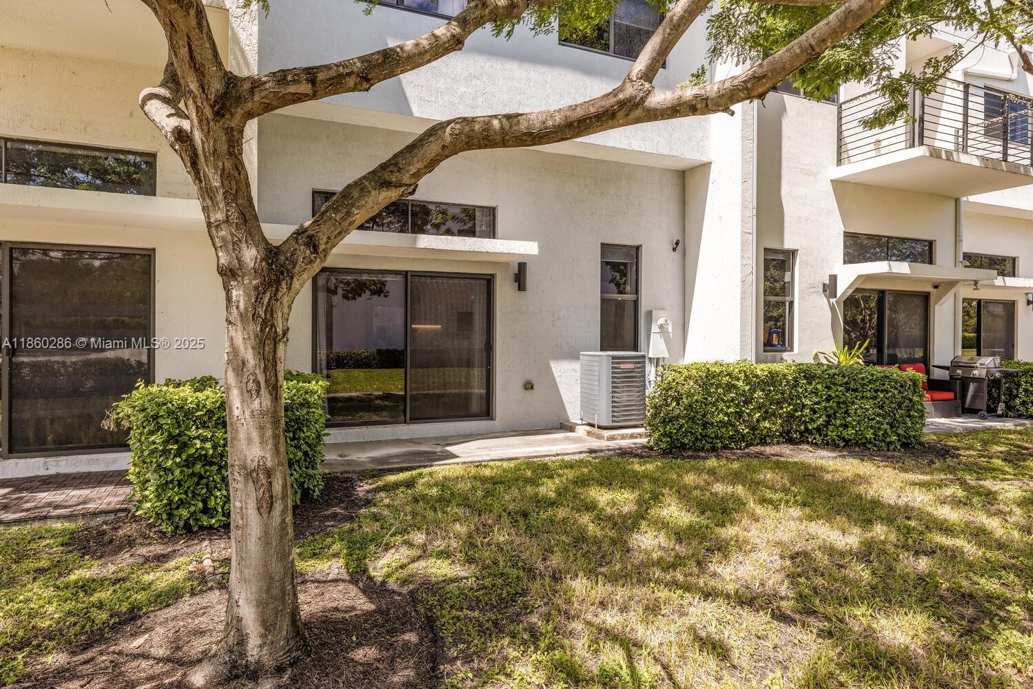 4444 Northwest 8th Court Plantation, FL 33317 - Photo 26 of 40 a view of a house with brick walls