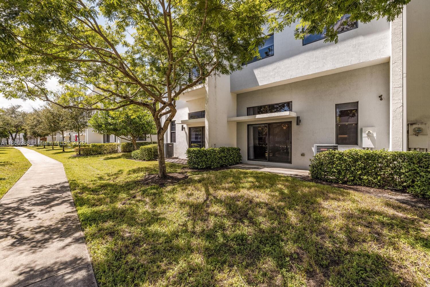 4444 Northwest 8th Court Plantation, FL 33317 - Photo 27 of 40 a view of a house with a yard