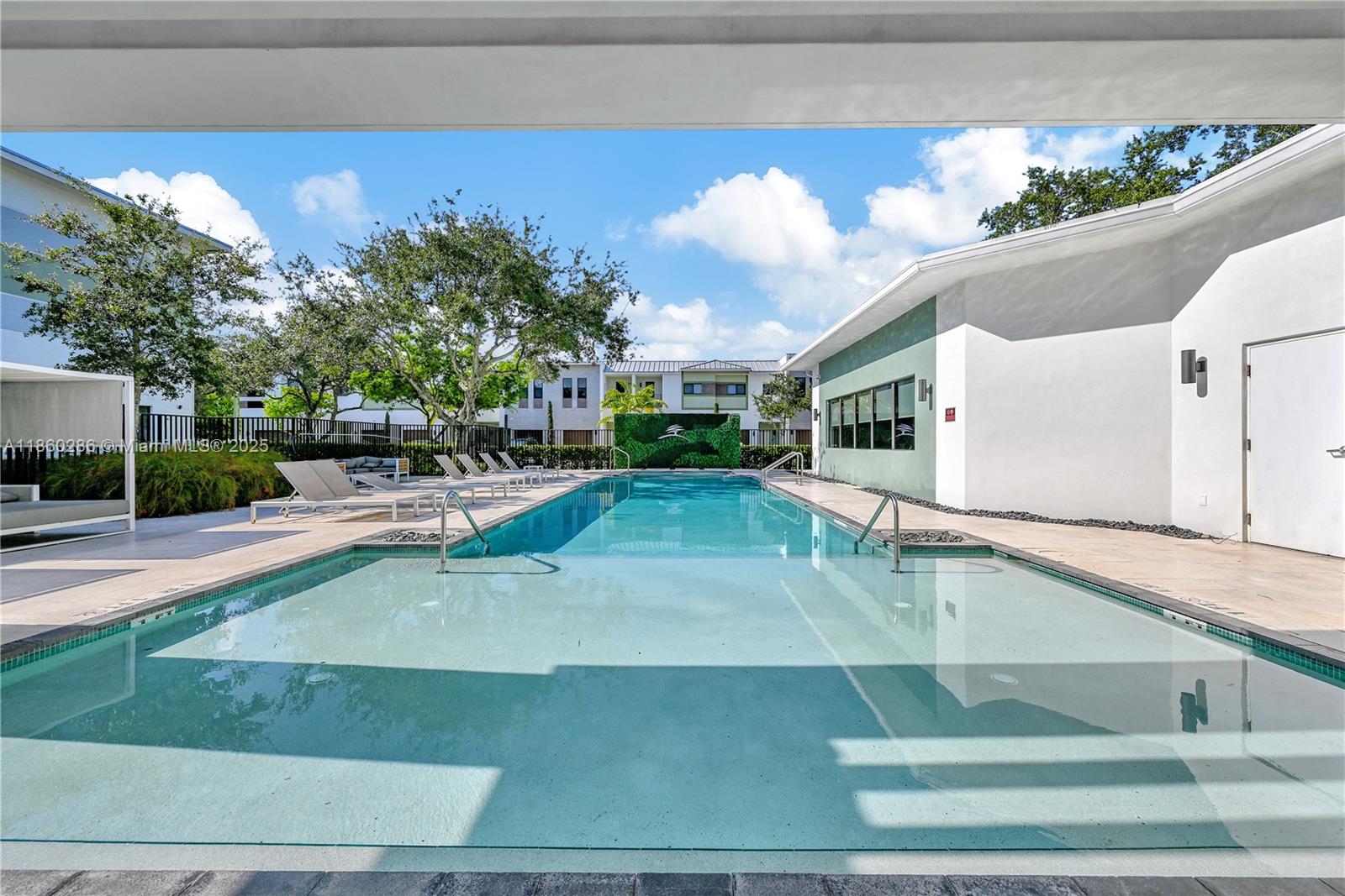 4444 Northwest 8th Court Plantation, FL 33317 - Photo 40 of 40 a view of a swimming pool with a patio