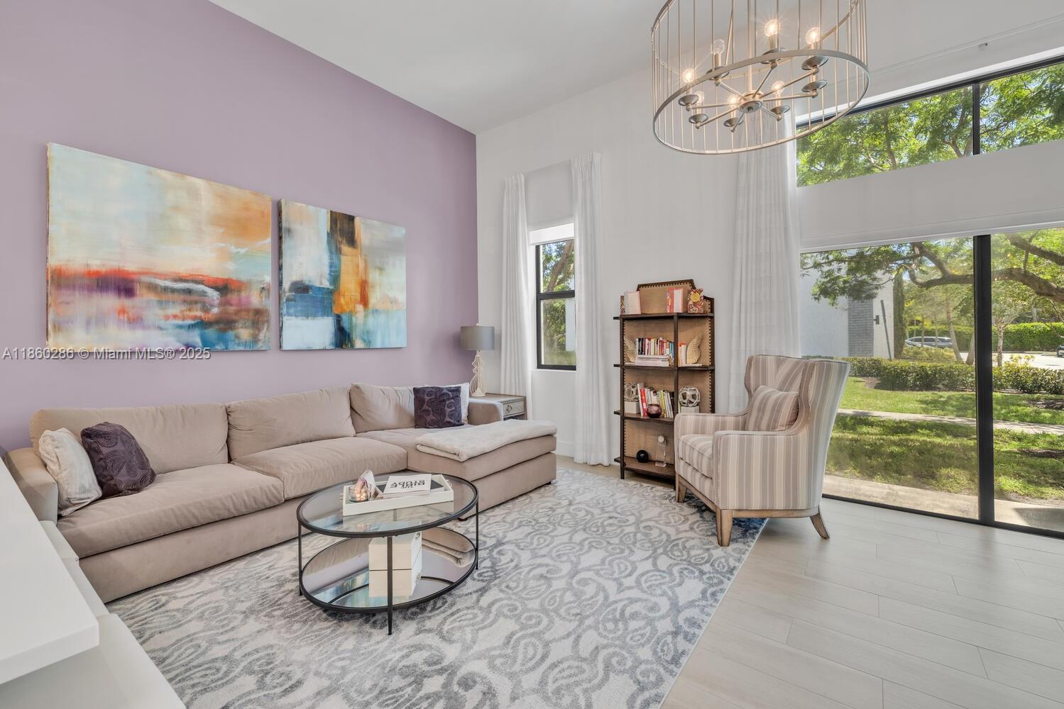 4444 Northwest 8th Court Plantation, FL 33317 - Photo 9 of 40 a living room with furniture and a wooden floor