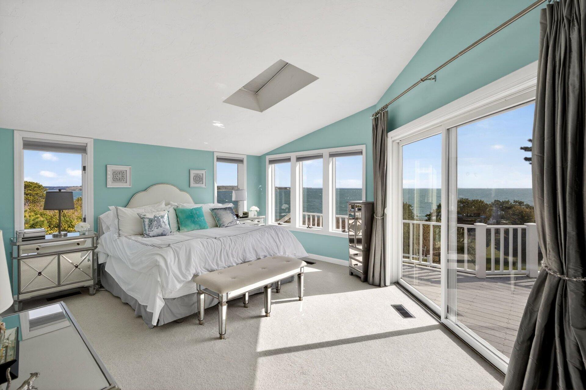 461 Wings Neck Road Pocasset, MA 02559 - Photo 20 of 42 a bed room with a bed and a view of balcony
