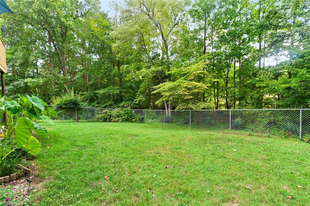 1701 Scarborough Road High Point, NC 27265 - Photo 26 of 30 Lush backyard with WOODED privacy!