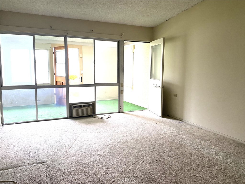 1621 Monterey Road Seal Beach, CA 90740 - Photo 5 of 10 a view of an empty room with a window
