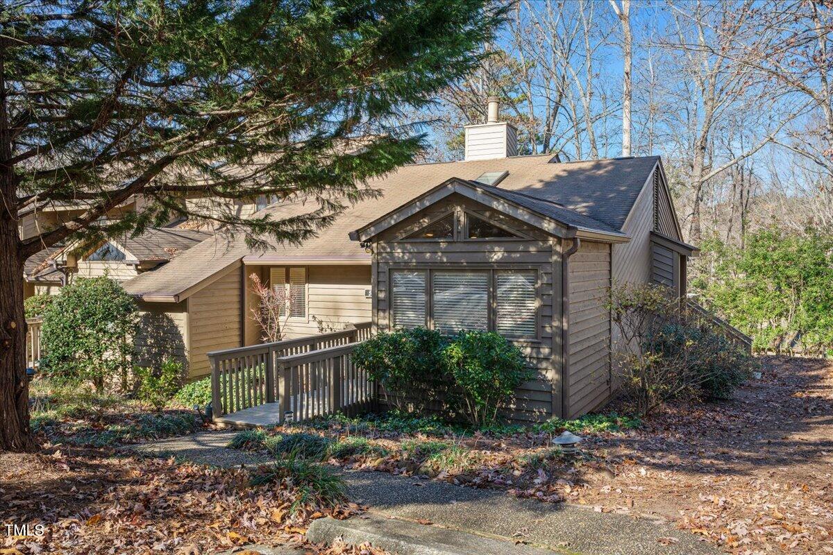 55 Stoneridge Road Durham, NC 27705 - Photo 7 of 35 a front view of a house with a yard