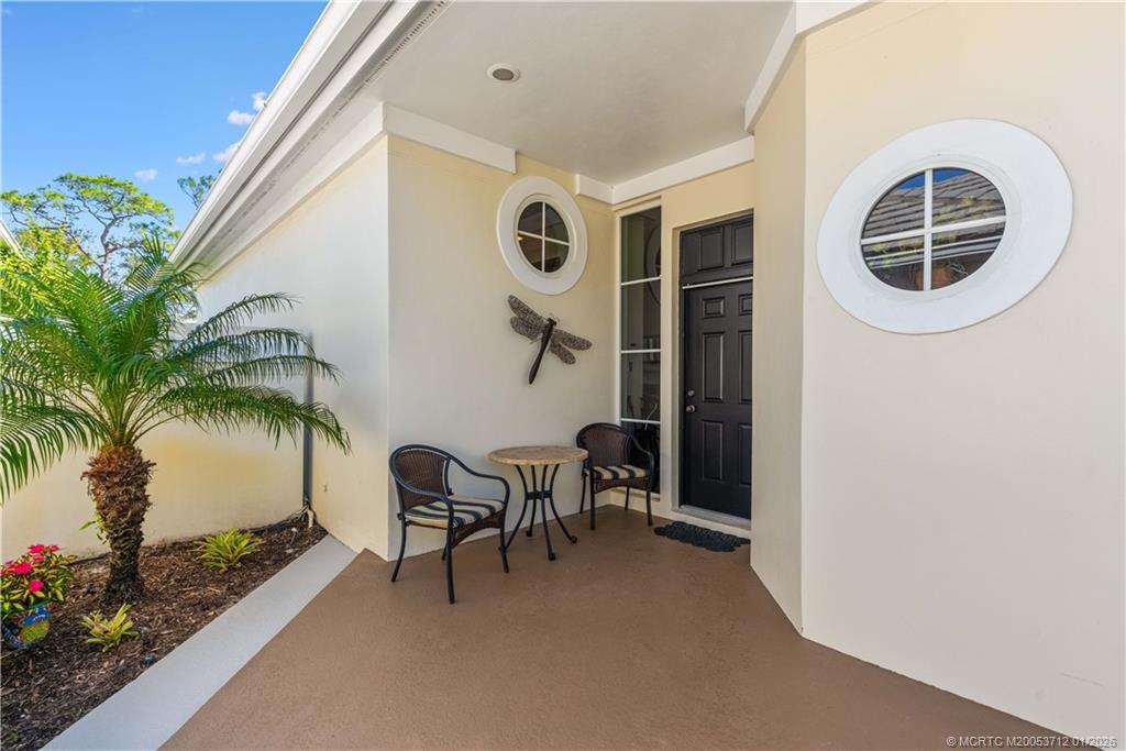 13265 Harbour Ridge Boulevard Palm City, FL 34990 - Photo 3 of 42 a view of livingroom with furniture and garden