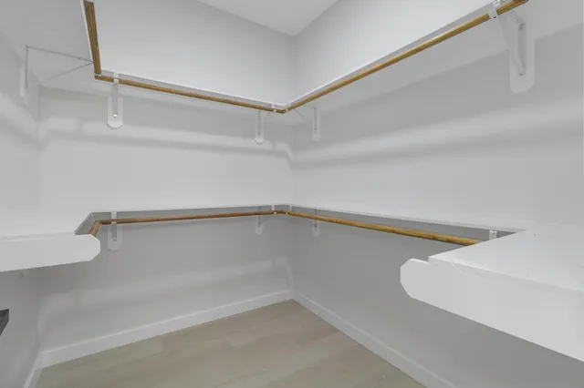 a view of a room with racks on the wall