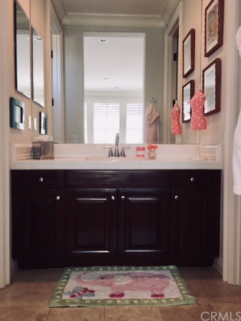 65 Old Course Drive Newport Beach, CA 92660 - Photo 8 of 15 Large junior suite features a walk-in closet, bathroom en suite, with tub and shower.