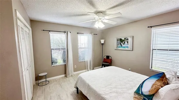 a kitchen with stainless steel appliances granite countertop a stove top oven a sink a counter space and cabinets
