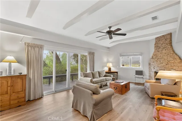 a bed room with a bed and a chair