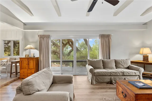a bathroom with a shower sink and mirror