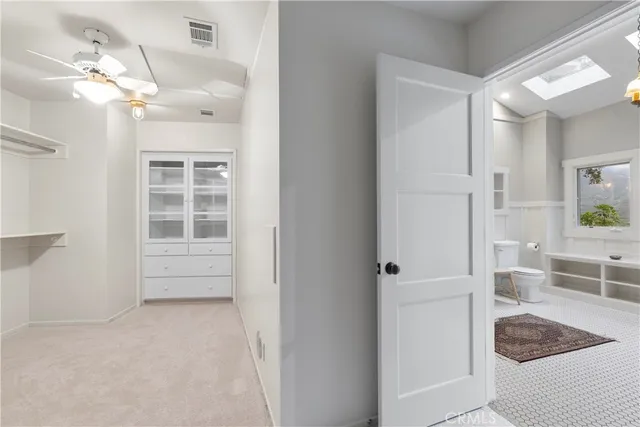 a kitchen with stainless steel appliances granite countertop a stove and a refrigerator