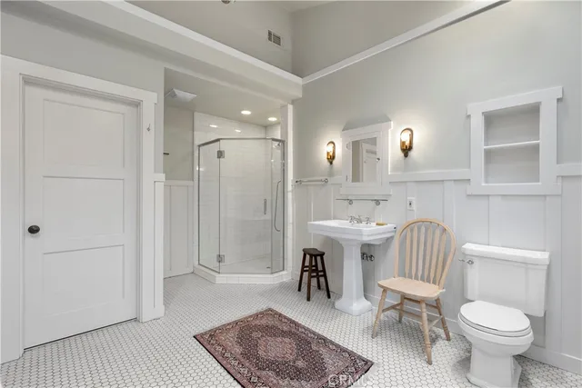 a dining room with furniture a window and a chandelier
