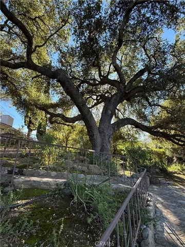 a view of a dinning table and chairs in the outdoor space