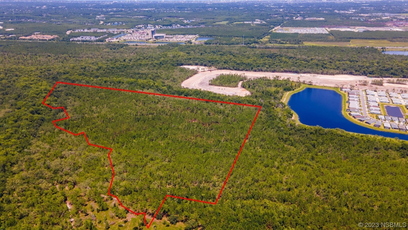 0 South Tymber Creek Road Ormond Beach, FL 32174 - Photo 11 of 24 an aerial view of residential houses with outdoor space and city view