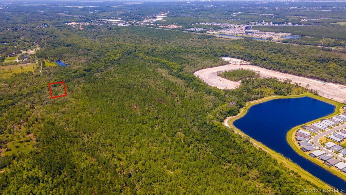 0 South Tymber Creek Road Ormond Beach, FL 32174 - Photo 20 of 24 an aerial view of residential houses with outdoor space and river