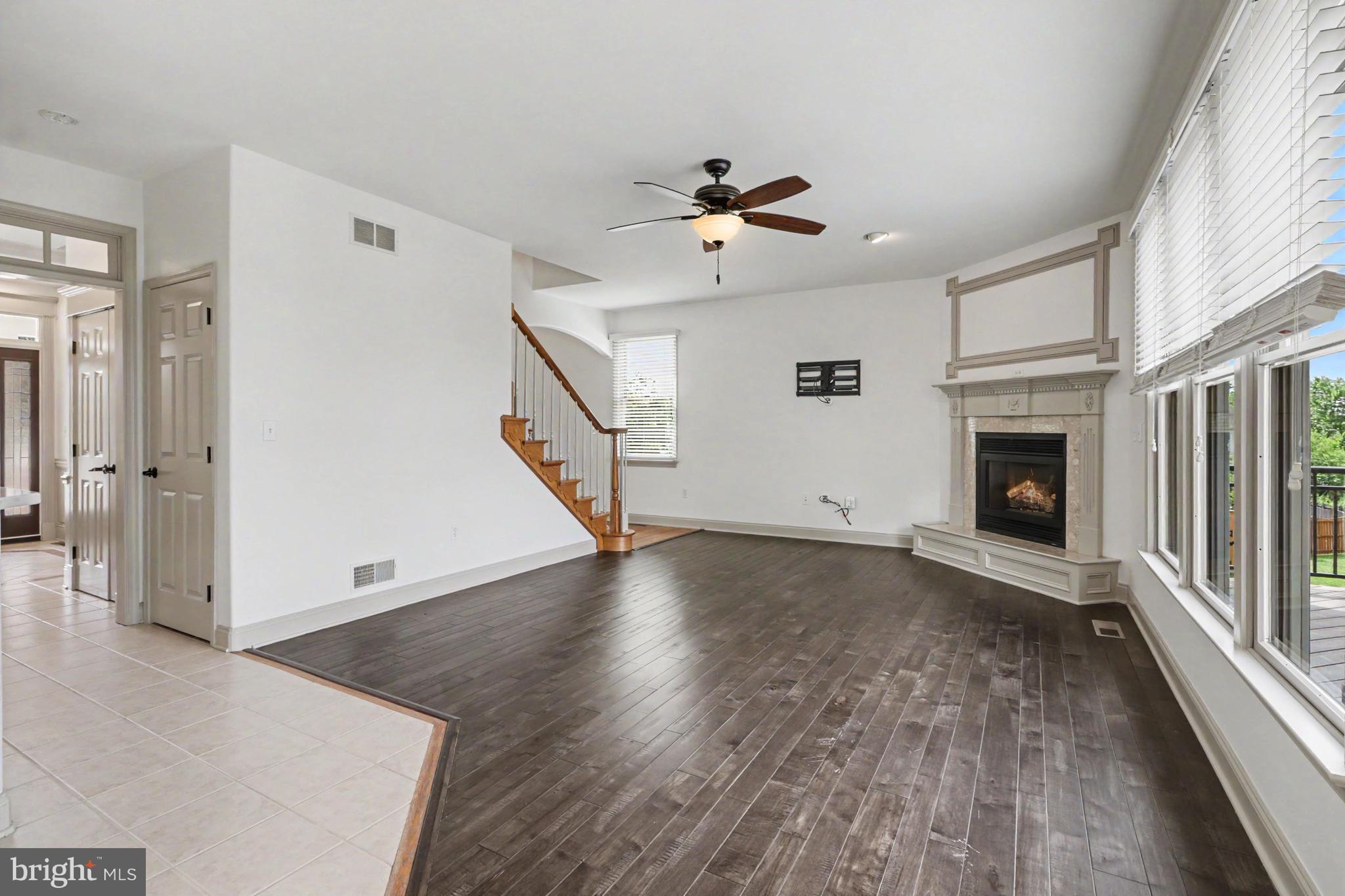 6539 Windmere Road Harrisburg, PA 17111 - Photo 19 of 82 Family rm w/ ceiling fan and corner gas fireplace