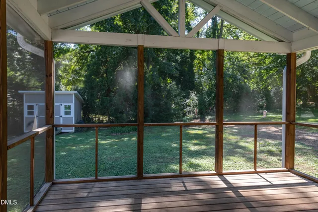 a view of backyard with green space