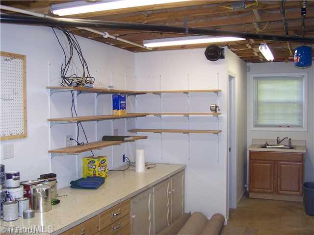 913 Old Winston Road High Point, NC 27265 - Photo 8 of 16 Workshop. Basement workshop