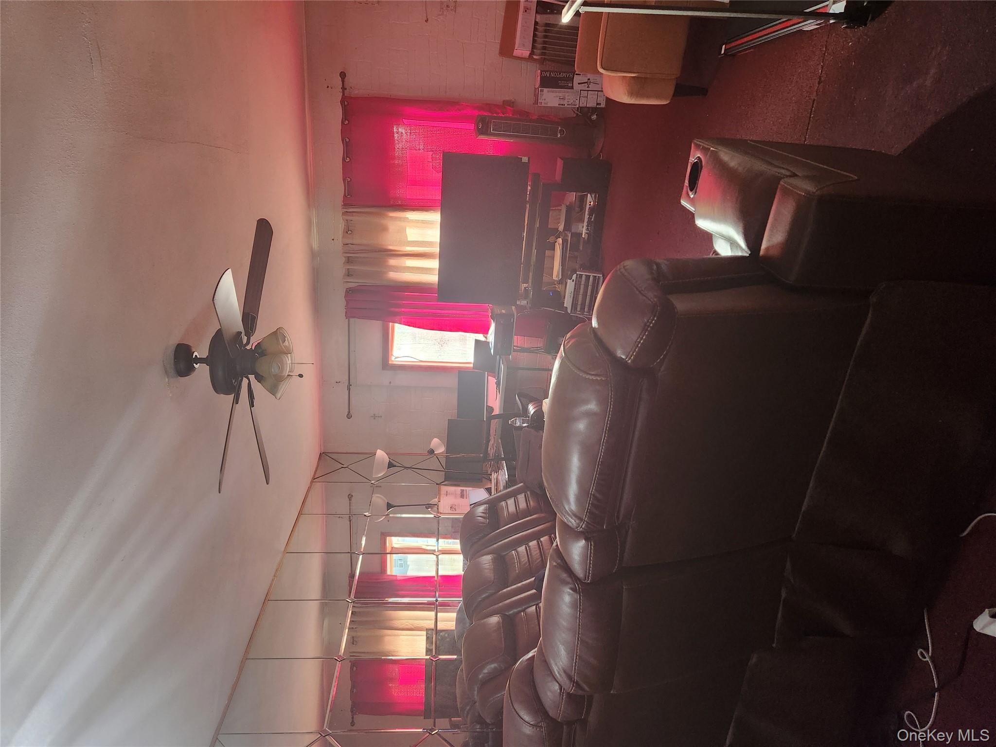 144-37 231st Street Queens, NY 11413 - Photo 2 of 5 a room with lots of chairs and tables