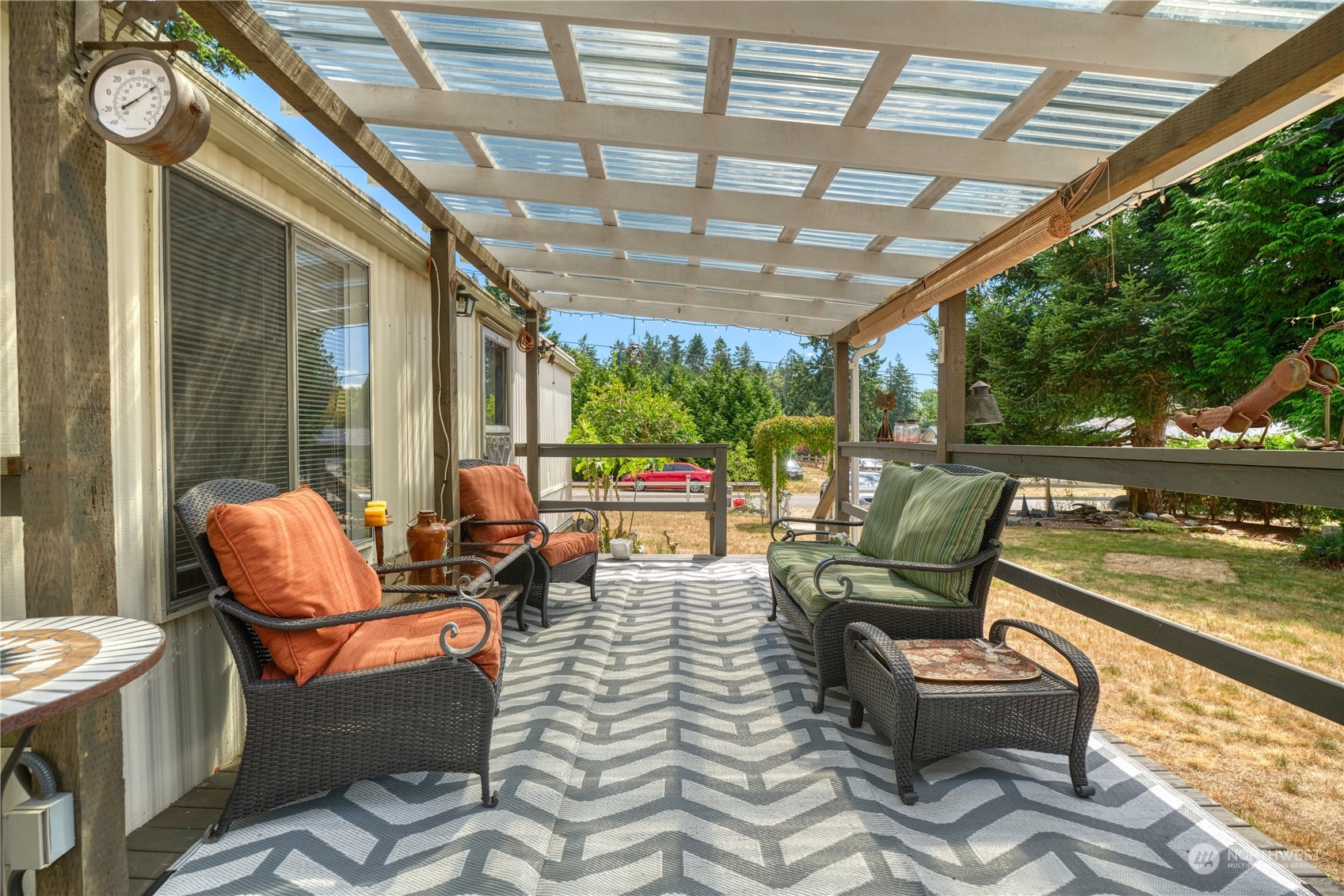 2228 Williams Road Point Roberts, WA 98281 - Photo 5 of 25 a building outdoor space with patio furniture