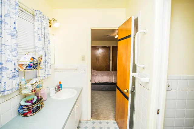 a bedroom with furniture and a bed