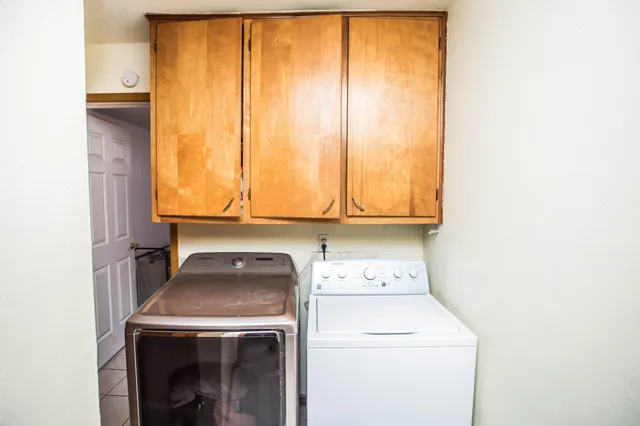 a view of a living room and entry way
