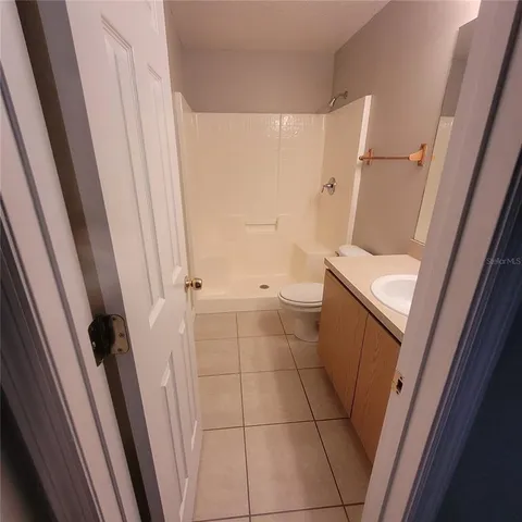 a bathroom with a sink and toilet