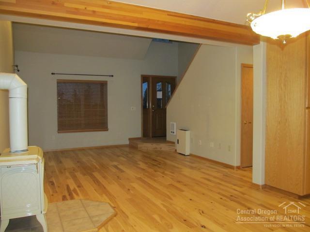 21626 Northeast Butler Market Road Bend, OR 97701 - Photo 2 of 23 a view of an empty room