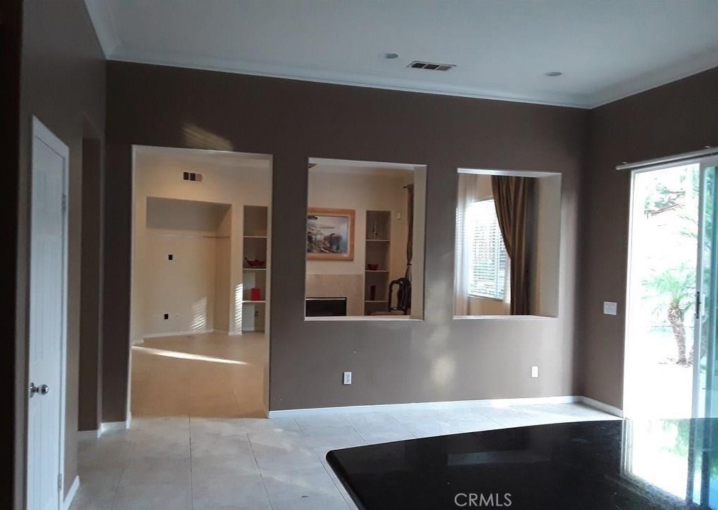 12701 Palm View Way Riverside, CA 92503 - Photo 17 of 26 a view of a living room with a large window