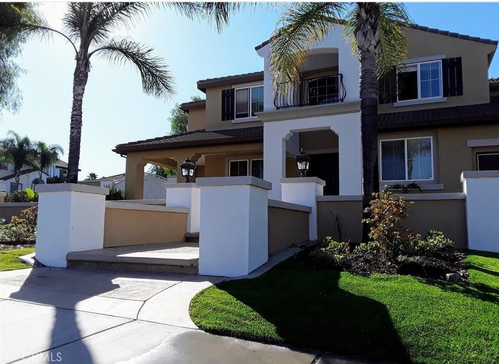 12701 Palm View Way Riverside, CA 92503 - Photo 2 of 26 a view of a house with a garden