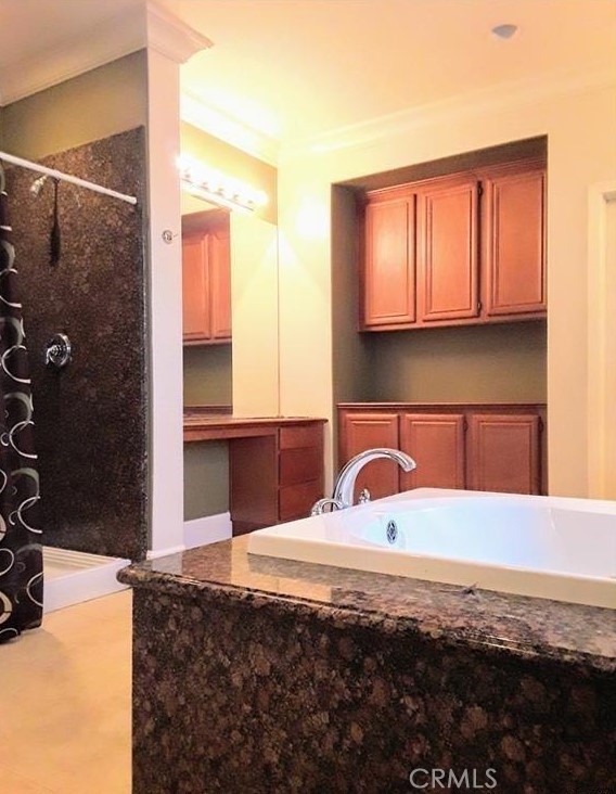 12701 Palm View Way Riverside, CA 92503 - Photo 21 of 26 a bathroom with a sink and a mirror