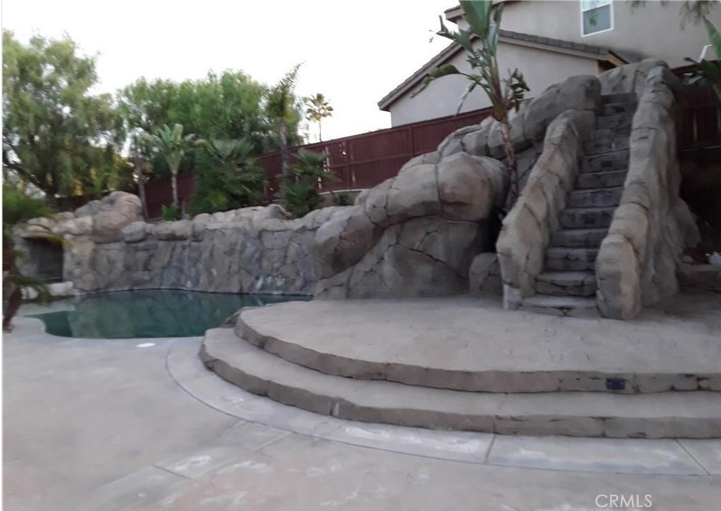 12701 Palm View Way Riverside, CA 92503 - Photo 10 of 26 a view of a house with a park