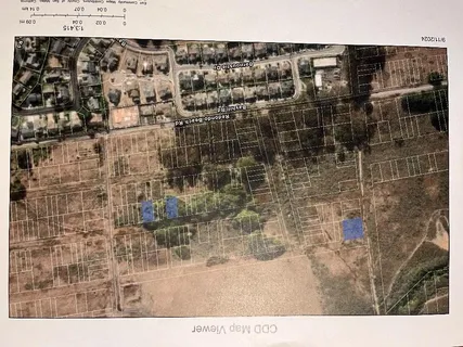 view of a bathroom with a shower and a door