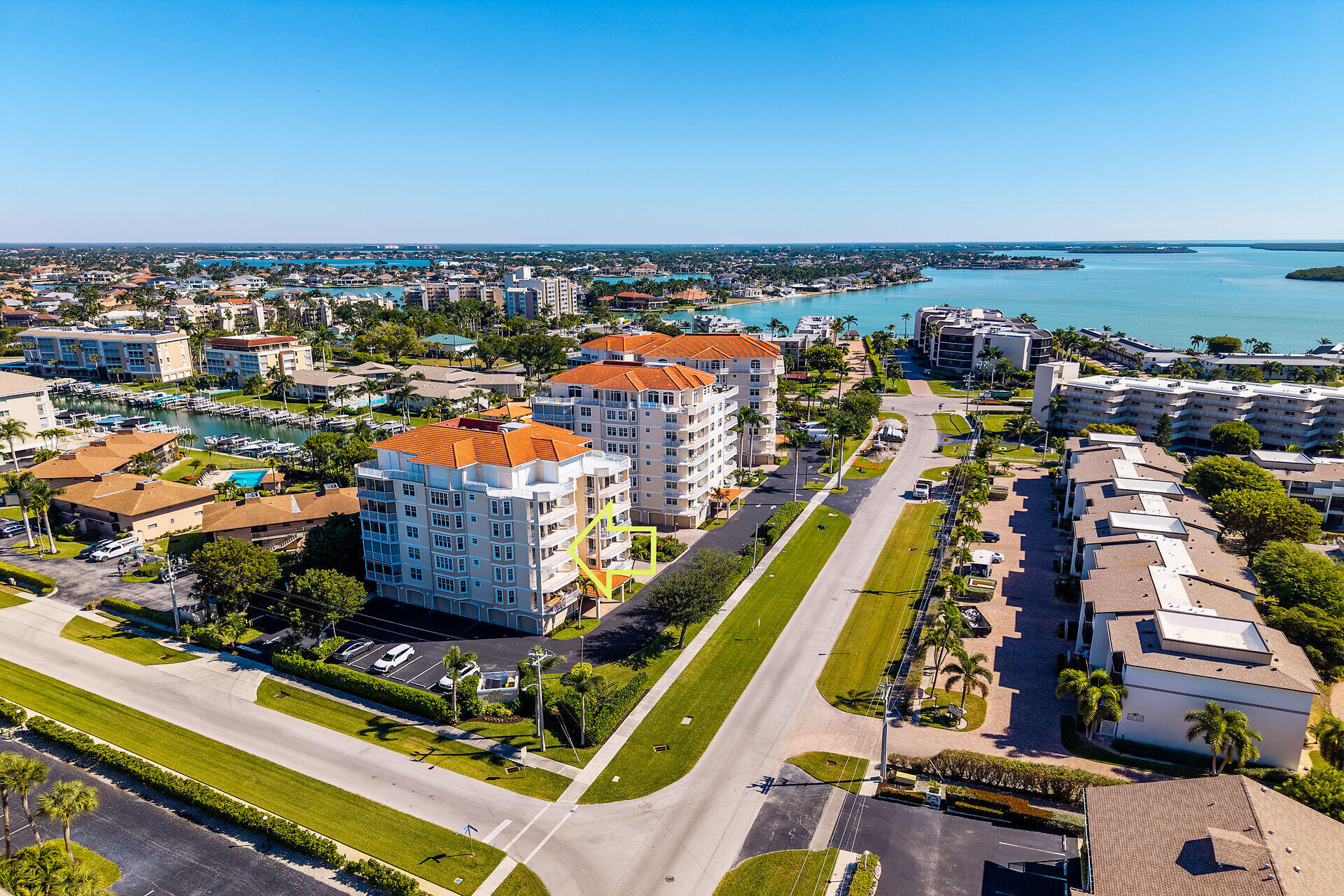 1111 Swallow Avenue, Unit 1401 Marco Island, FL 34145 - Photo 5 of 36 an aerial view of multiple house