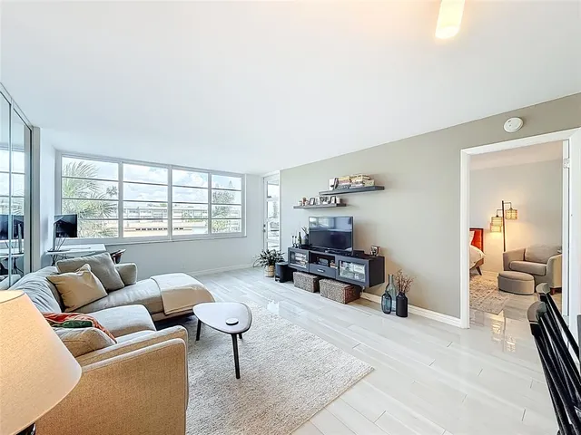 a room with furniture and flat screen tv