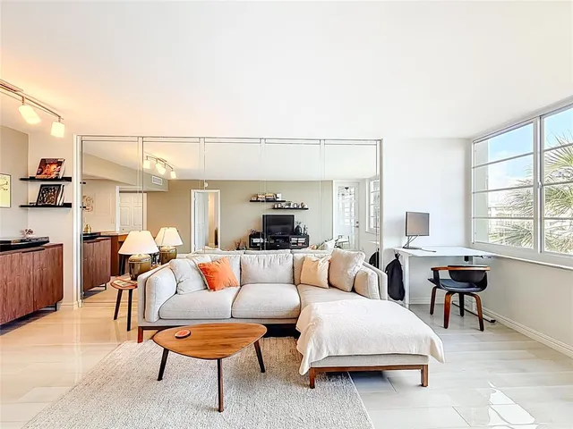 a bed room with a bed and a lamp