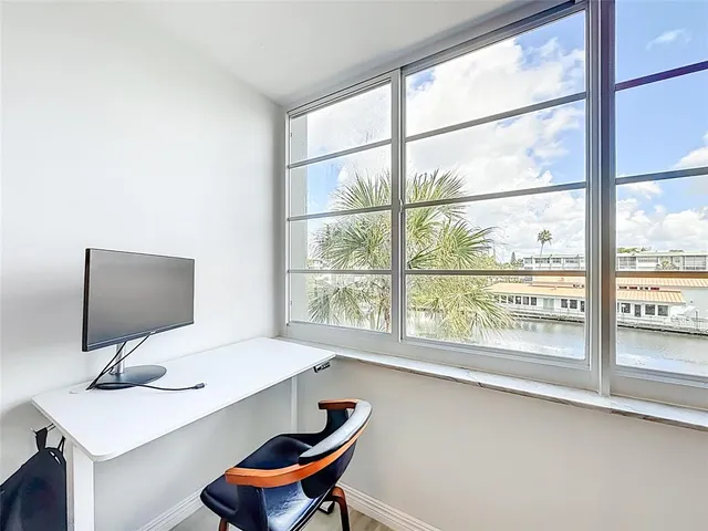 a view of a lake with building in front of it