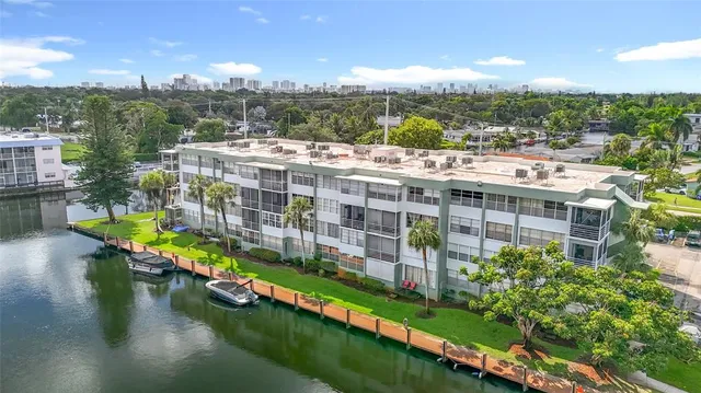 a front view of a house with parking space