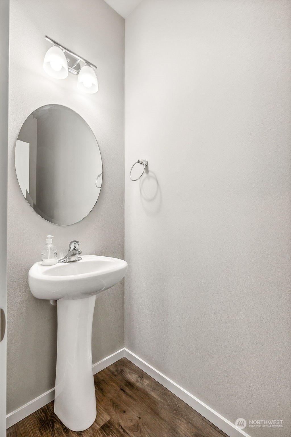 2926 Fiddleback Street Northeast Lacey, WA 98516 - Photo 12 of 29 a bathroom with a sink a toilet and mirror