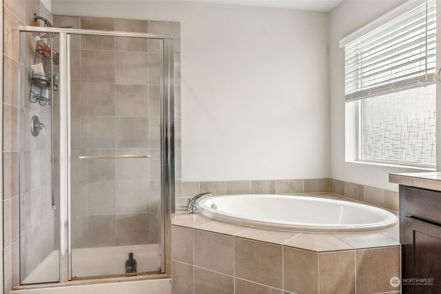 2926 Fiddleback Street Northeast Lacey, WA 98516 - Photo 16 of 29 a bathroom with a bath tub and shower