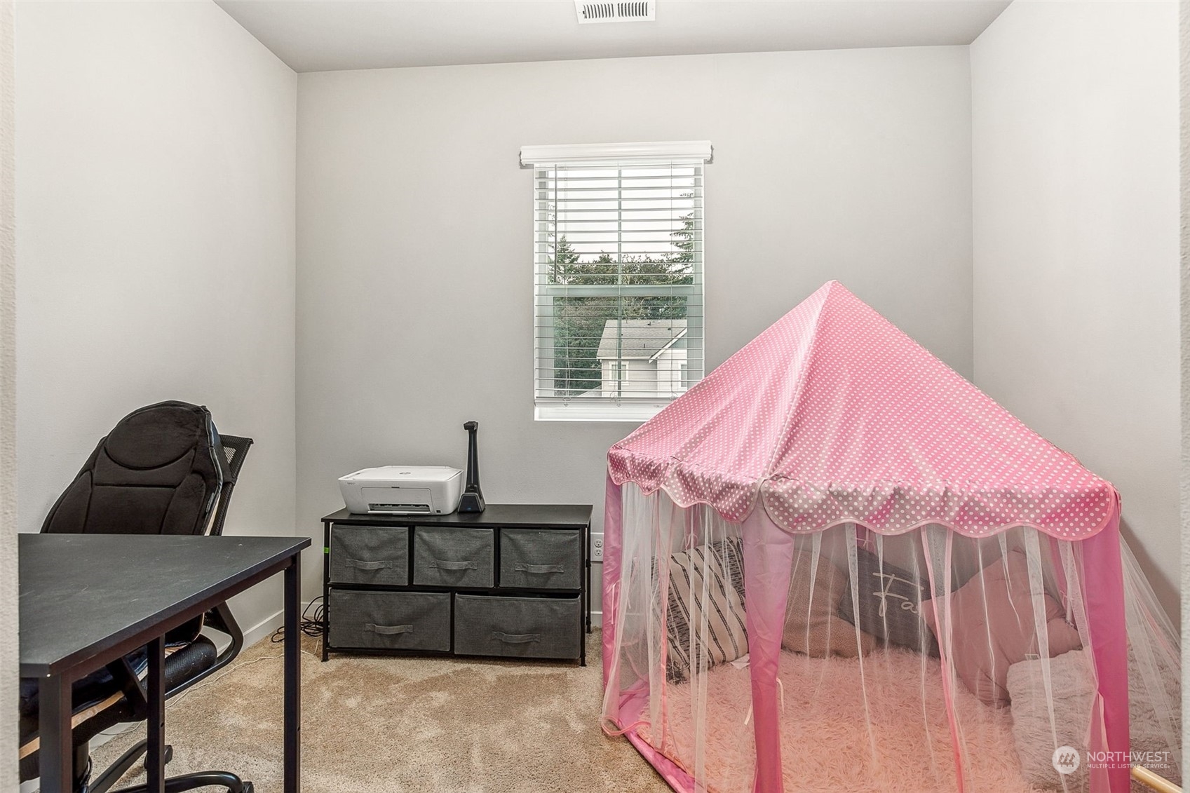 2926 Fiddleback Street Northeast Lacey, WA 98516 - Photo 19 of 29 a bedroom with a bed and a window