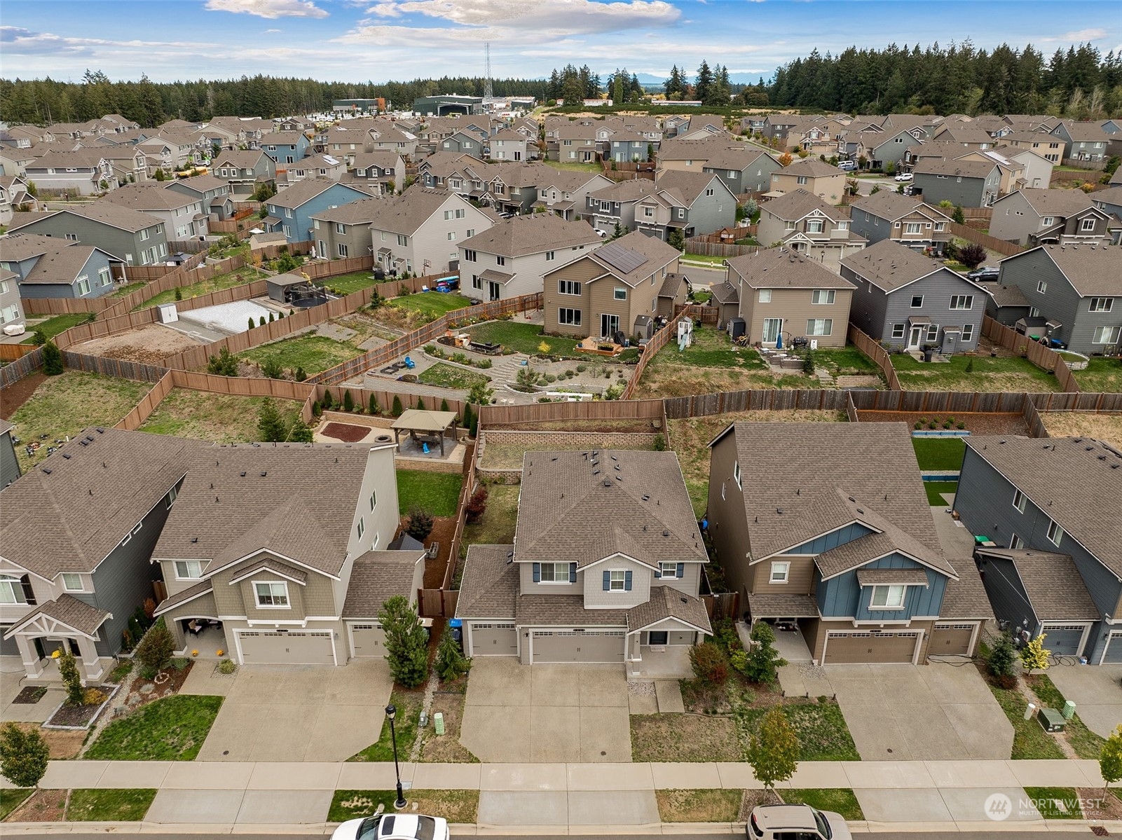 2926 Fiddleback Street Northeast Lacey, WA 98516 - Photo 28 of 29 an aerial view of residential houses with outdoor space