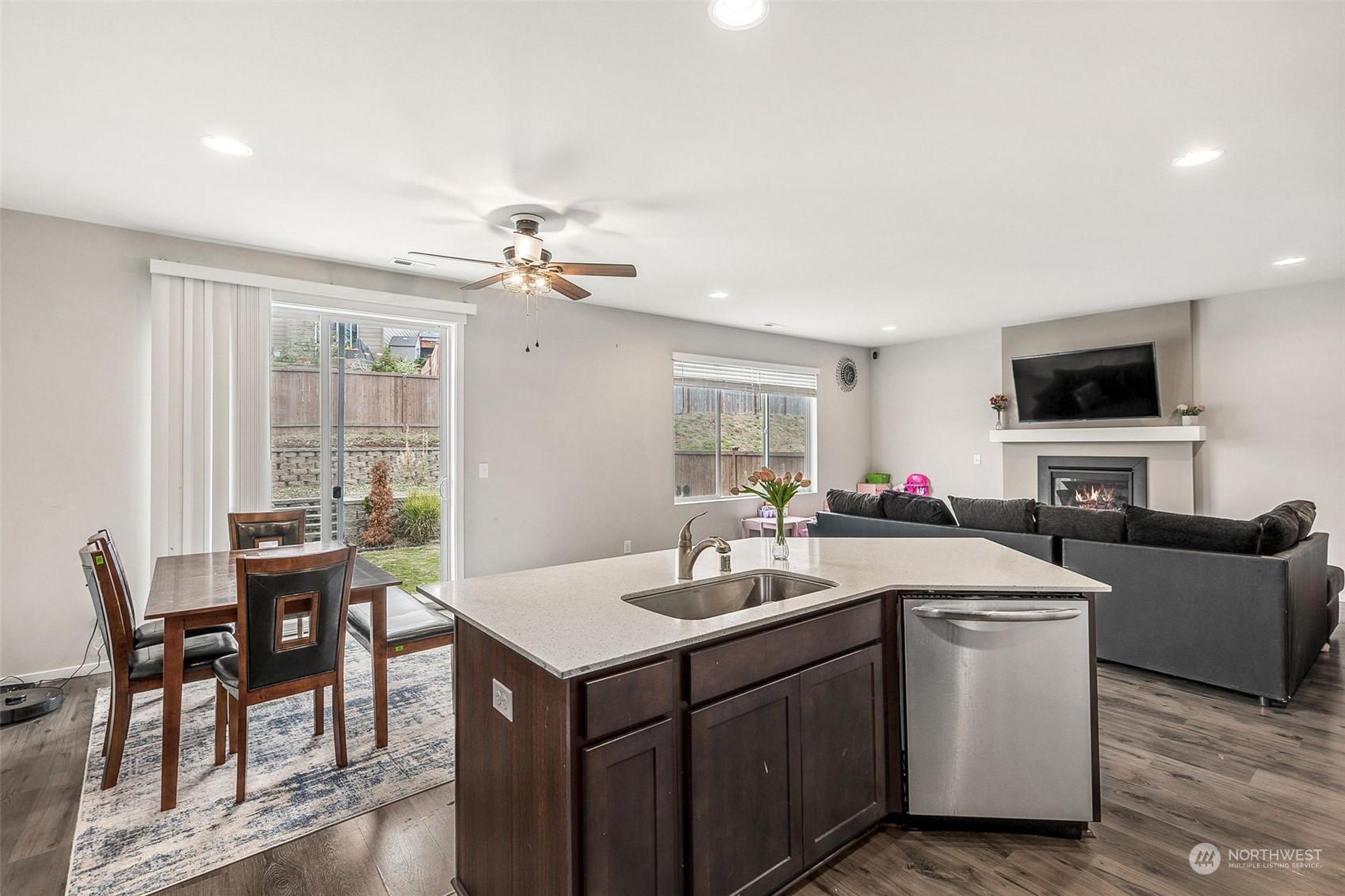 2926 Fiddleback Street Northeast Lacey, WA 98516 - Photo 10 of 29 a view of a dining room with furniture and wooden floor
