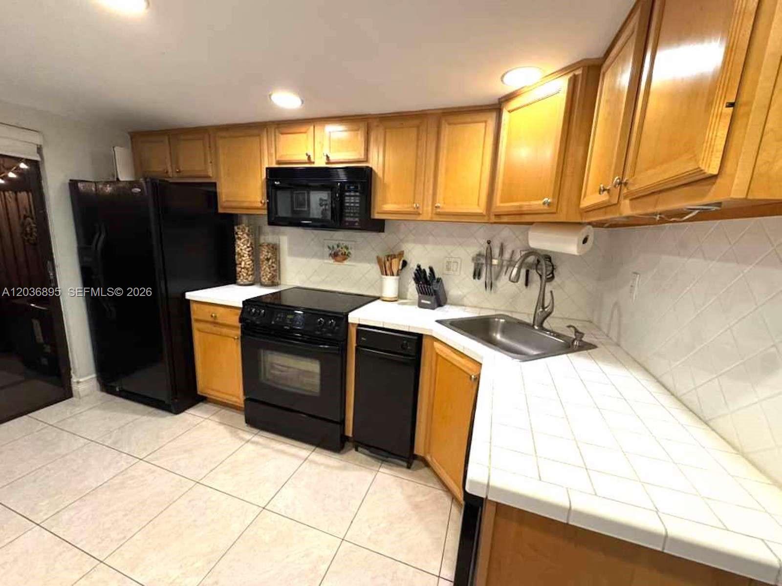 10044 Southwest 77th Court Miami, FL 33156 - Photo 3 of 18