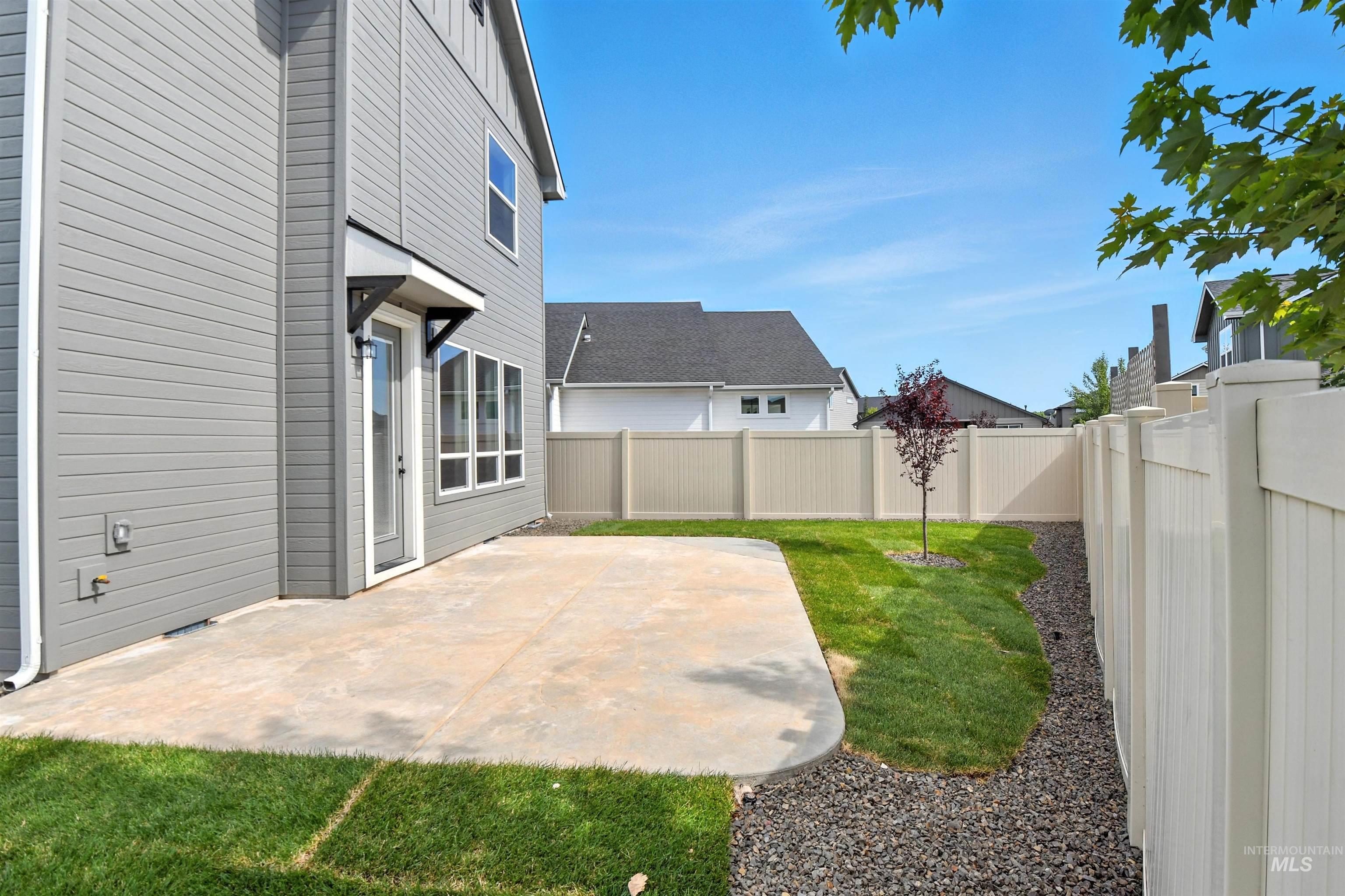 3521 South El Rio Avenue Boise, ID 83709 - Photo 37 of 38 Fenced backyard with a patio
