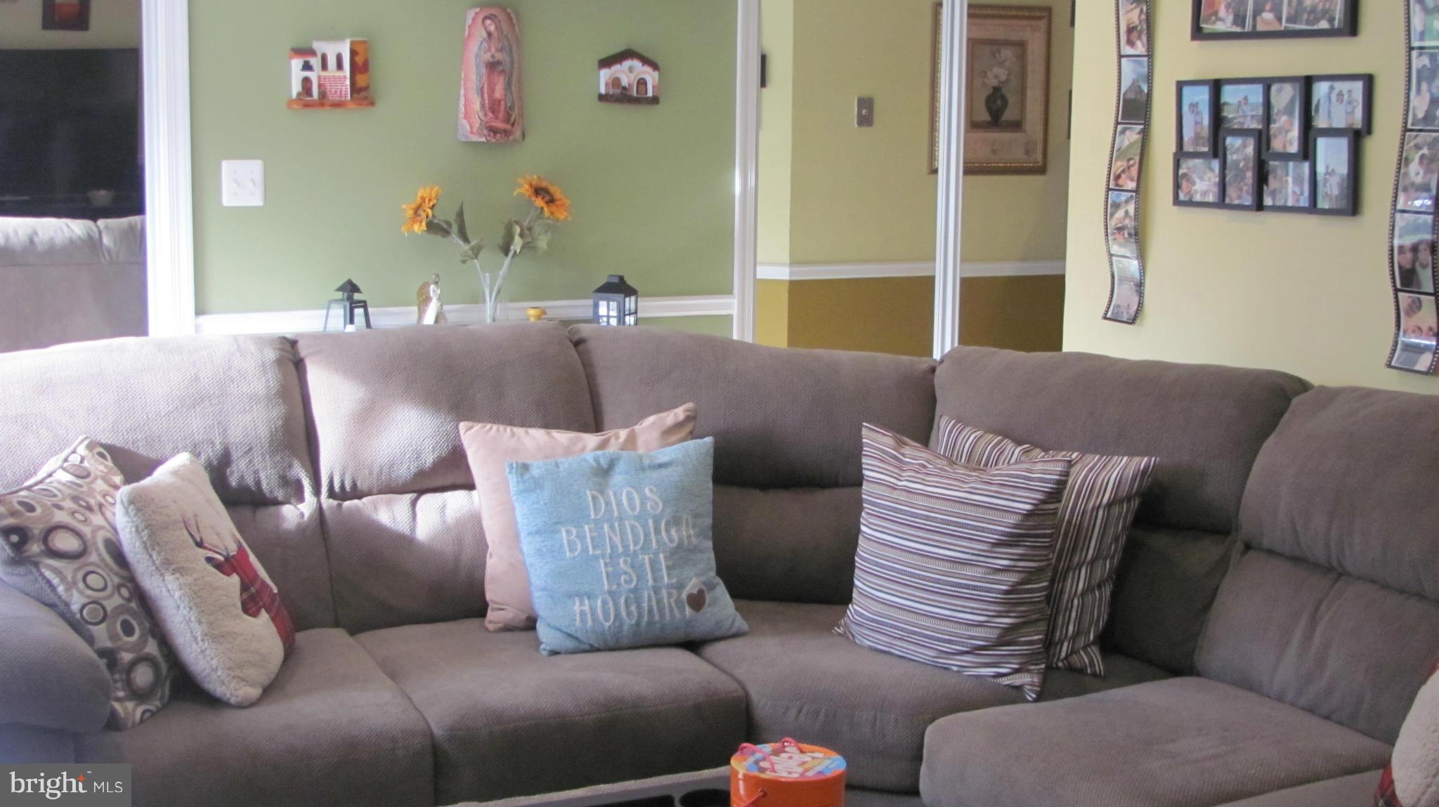 2929 Gracefield Road Silver Spring, MD 20904 - Photo 11 of 25 a living room with furniture and a large window