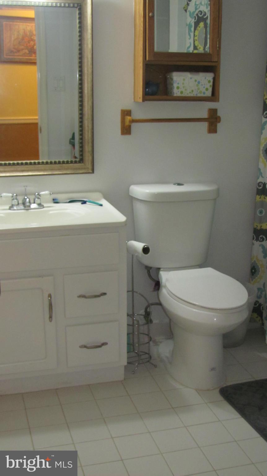 2929 Gracefield Road Silver Spring, MD 20904 - Photo 12 of 25 a bathroom with a toilet and a sink