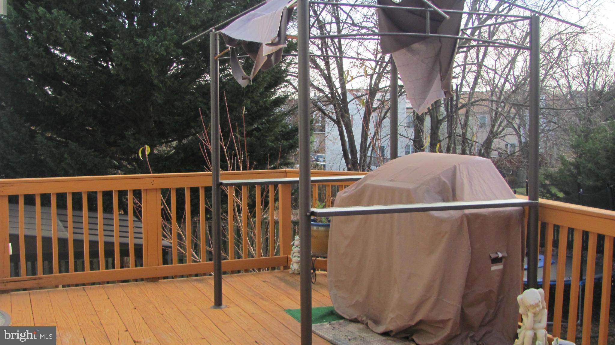 2929 Gracefield Road Silver Spring, MD 20904 - Photo 15 of 25 a view of outdoor space with deck and yard