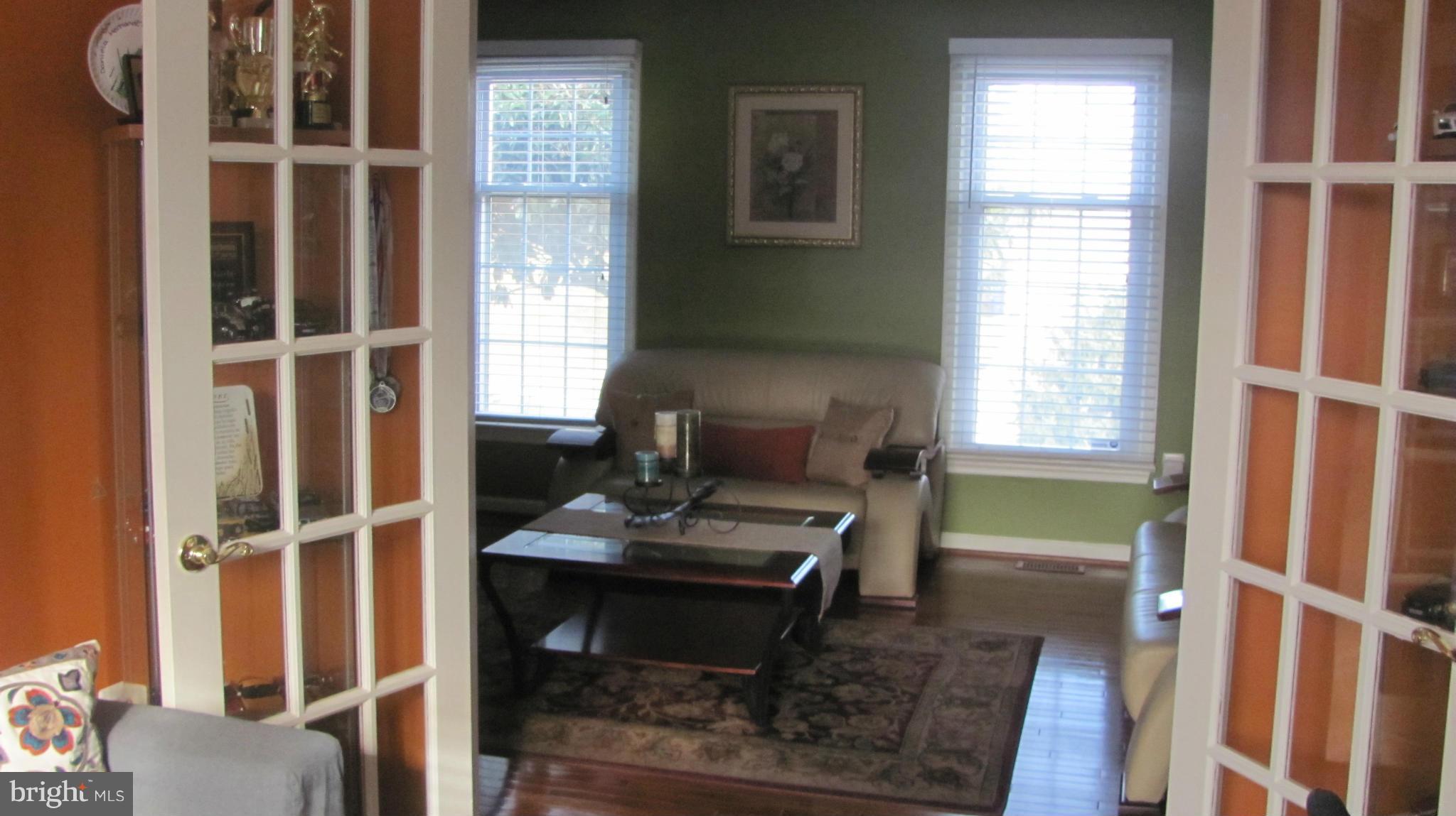 2929 Gracefield Road Silver Spring, MD 20904 - Photo 18 of 25 a living room with furniture and a window