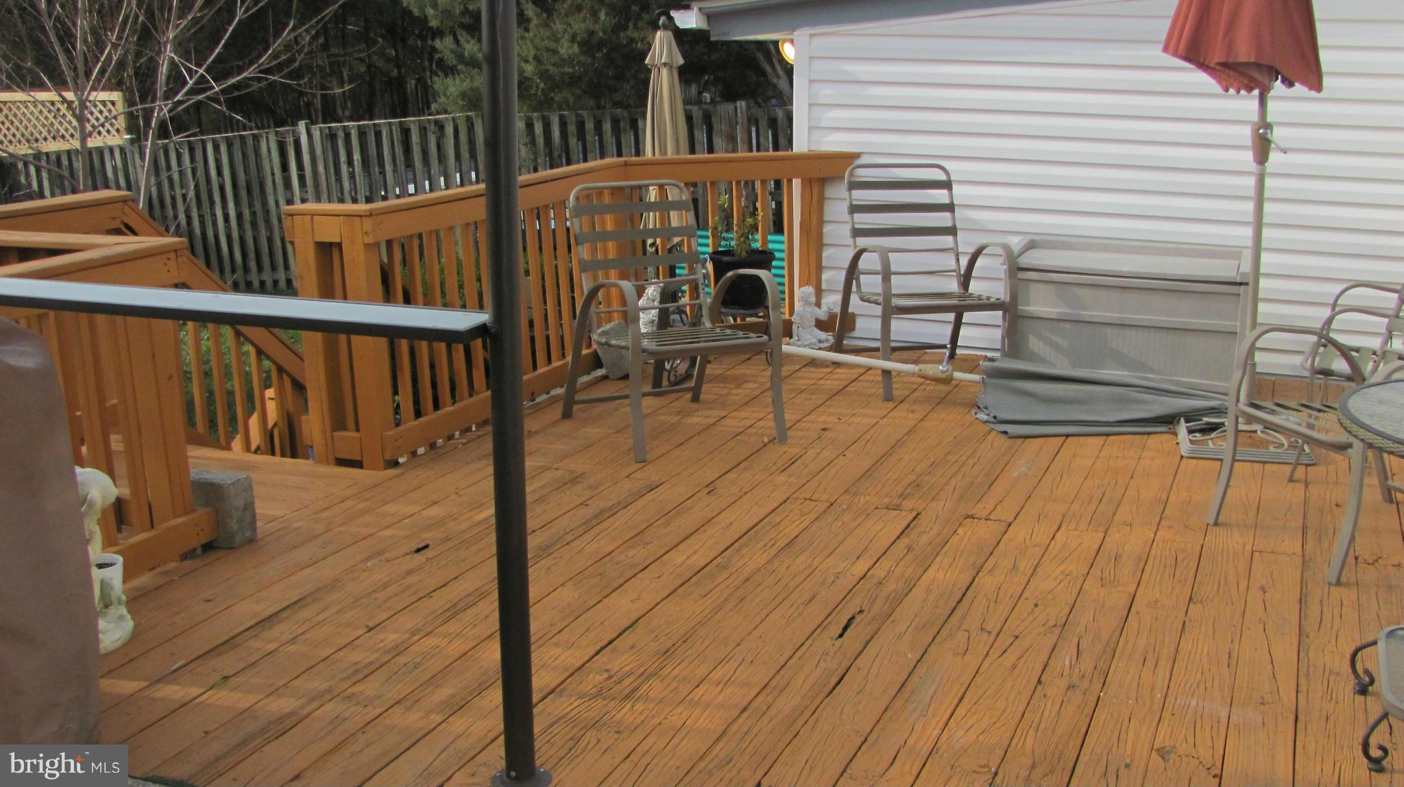 2929 Gracefield Road Silver Spring, MD 20904 - Photo 23 of 25 a view of a patio with wooden floor